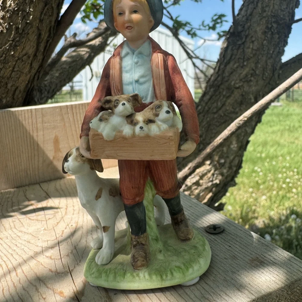 Norman Rockwell Puppy Love Figurine of Boy with Puppies